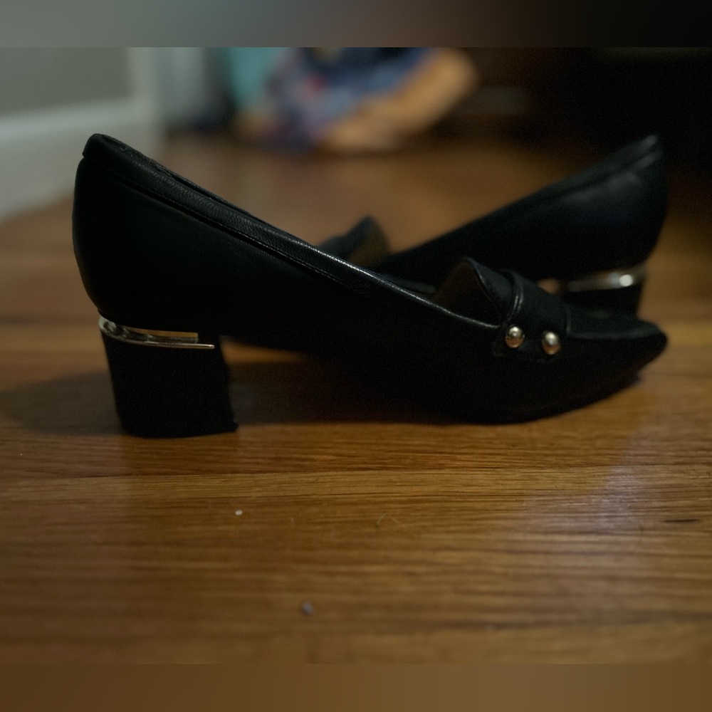 Black mules with a slight heel